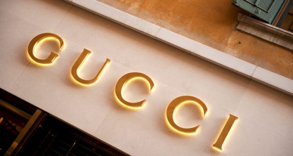 "Verona, Italy - June 15, 2012:  Gucci store sign located in Via Mazzini, the Veronese shopping street par excellence, with shops and boutiques of the most prestigious Italian and international fashion brands."